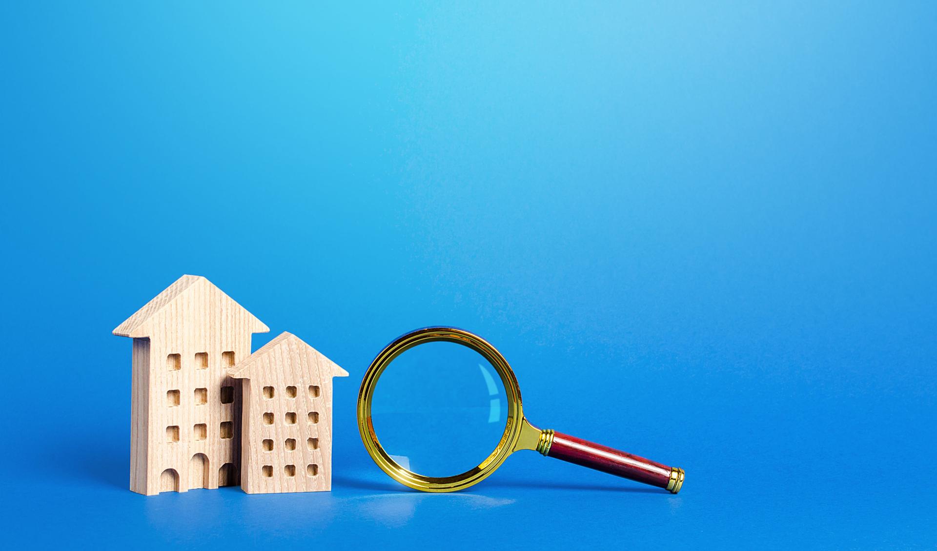 Residential buildings and magnifying glass. Search for real estate to buy. Long-term and short-term rental of apartments and housing. Real Estate Agent services. Important things when choosing a property.